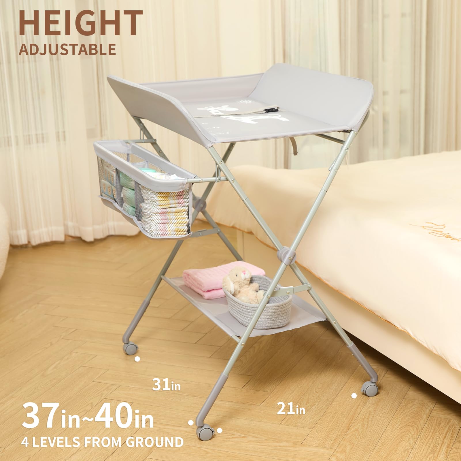 KARAOK changing table with wheels safety clip secures the baby during changes.