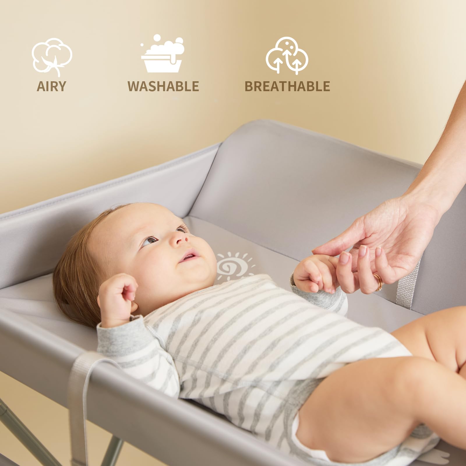 KARAOK changing table with wheels tension strap adds extra security.