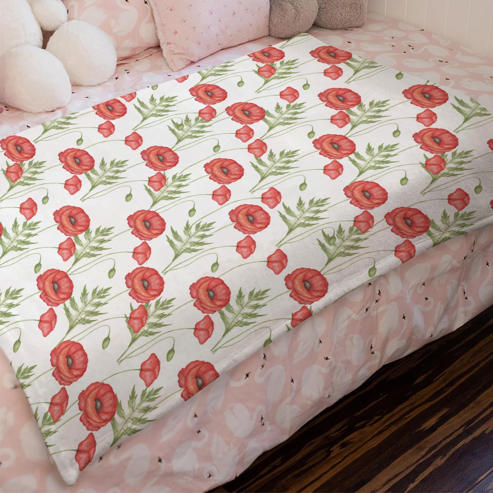 KASTLEE digital print poppy pattern blanket adds vivid color to nursery decor.