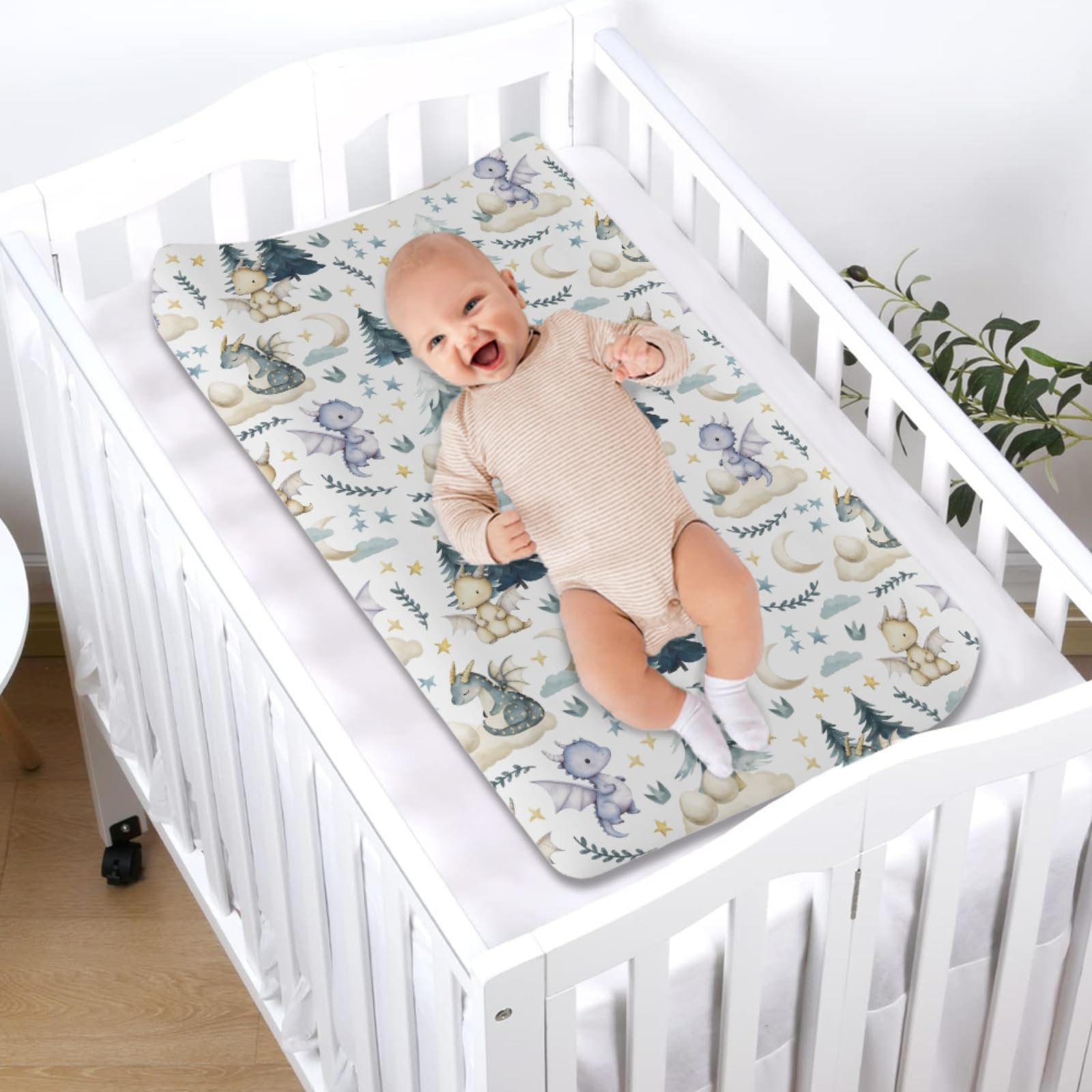 KASTLEE changing pad cover features elastic edge for a snug, slip-free fit.
