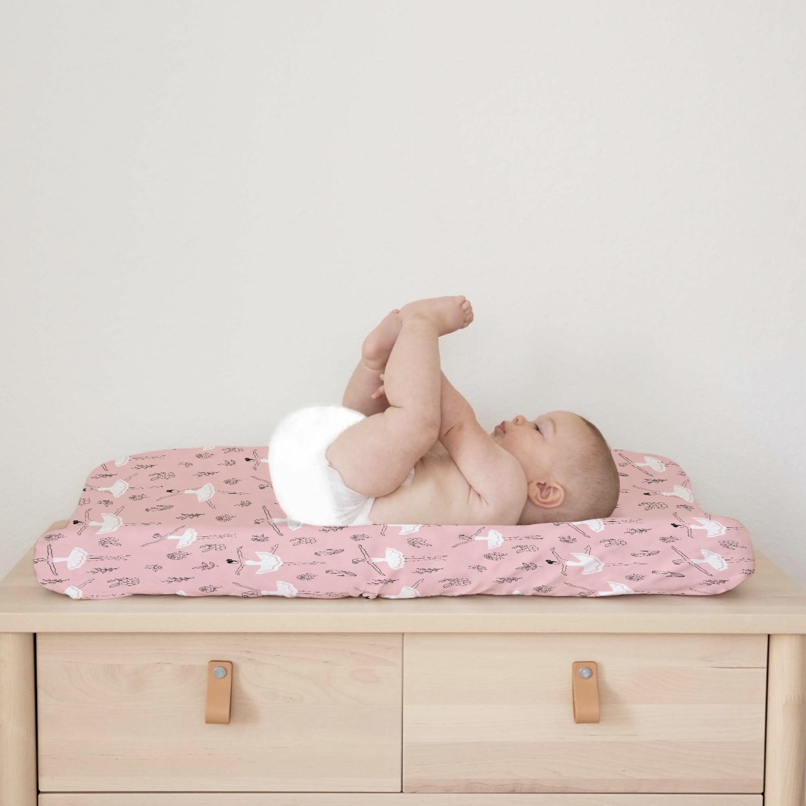 Nursery setup with KASTLEE Pink Ballet cover creates a cozy, coordinated look.