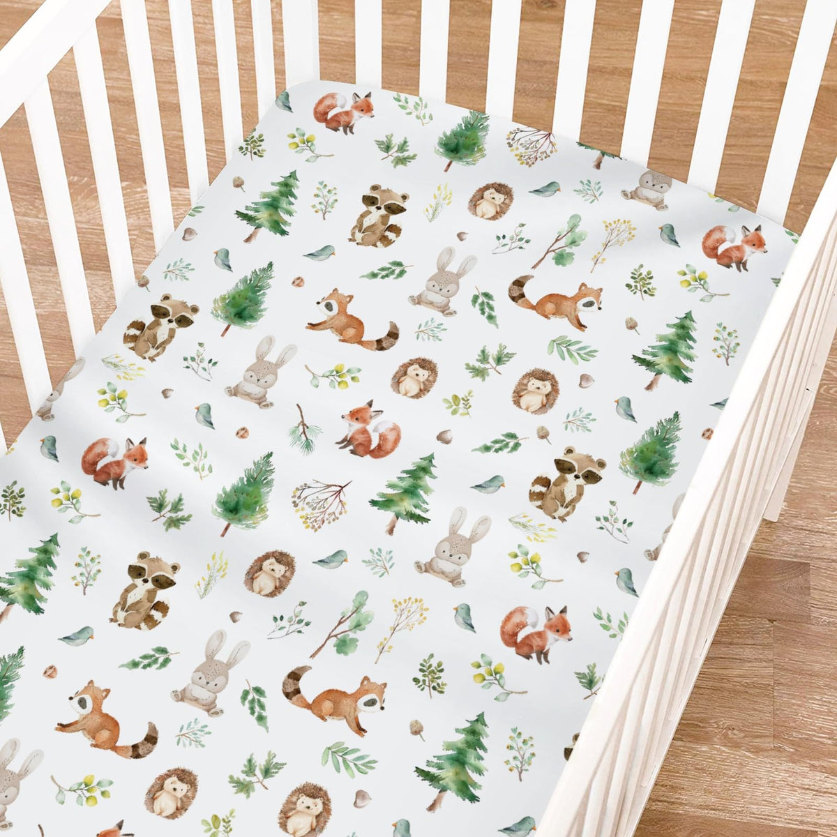 KASTLEE watercolor raccoon crib sheet offers cozy, breathable comfort for naps and nights