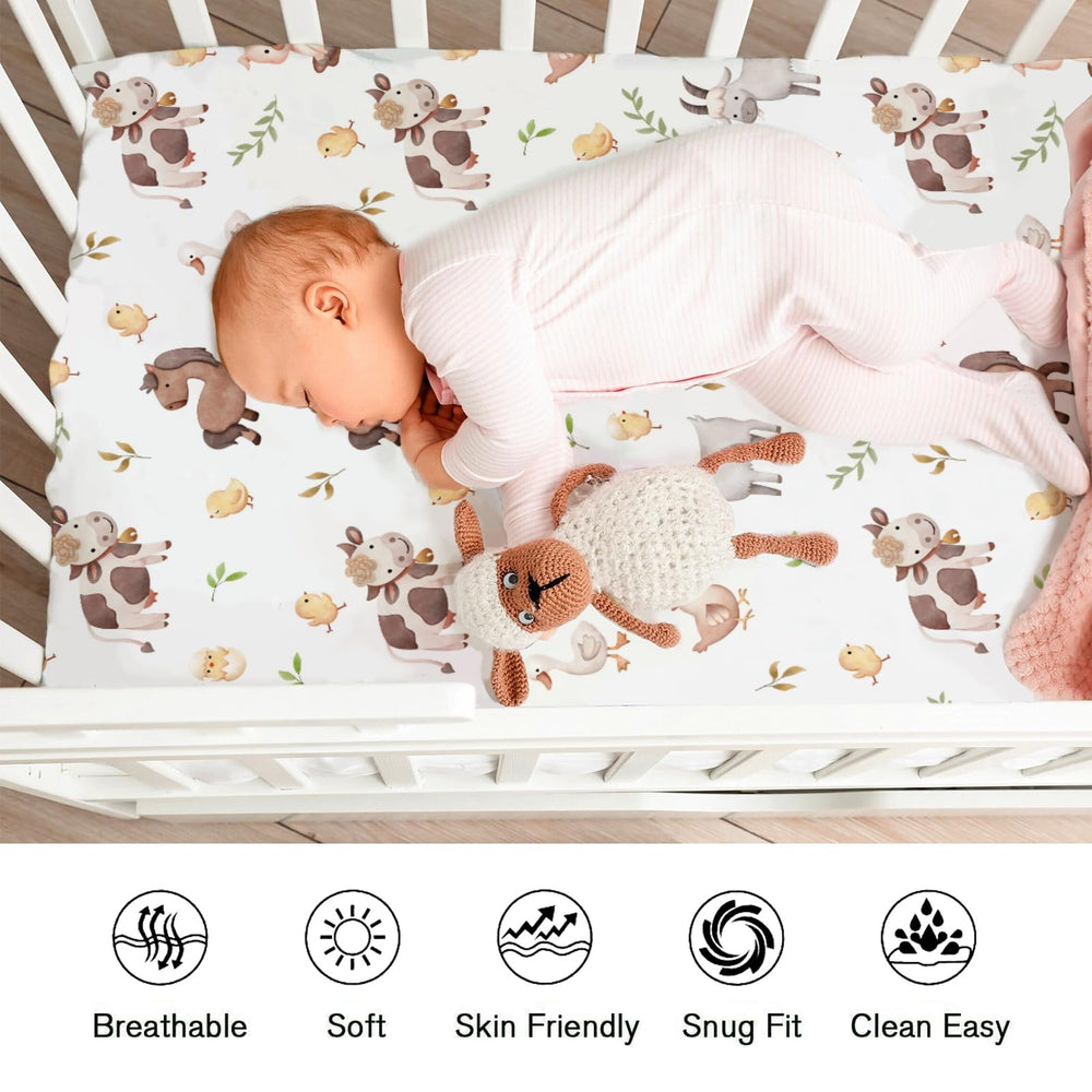 KASTLEE watercolor farm life cow crib sheet; durable, easy-care fabric for busy mornings.