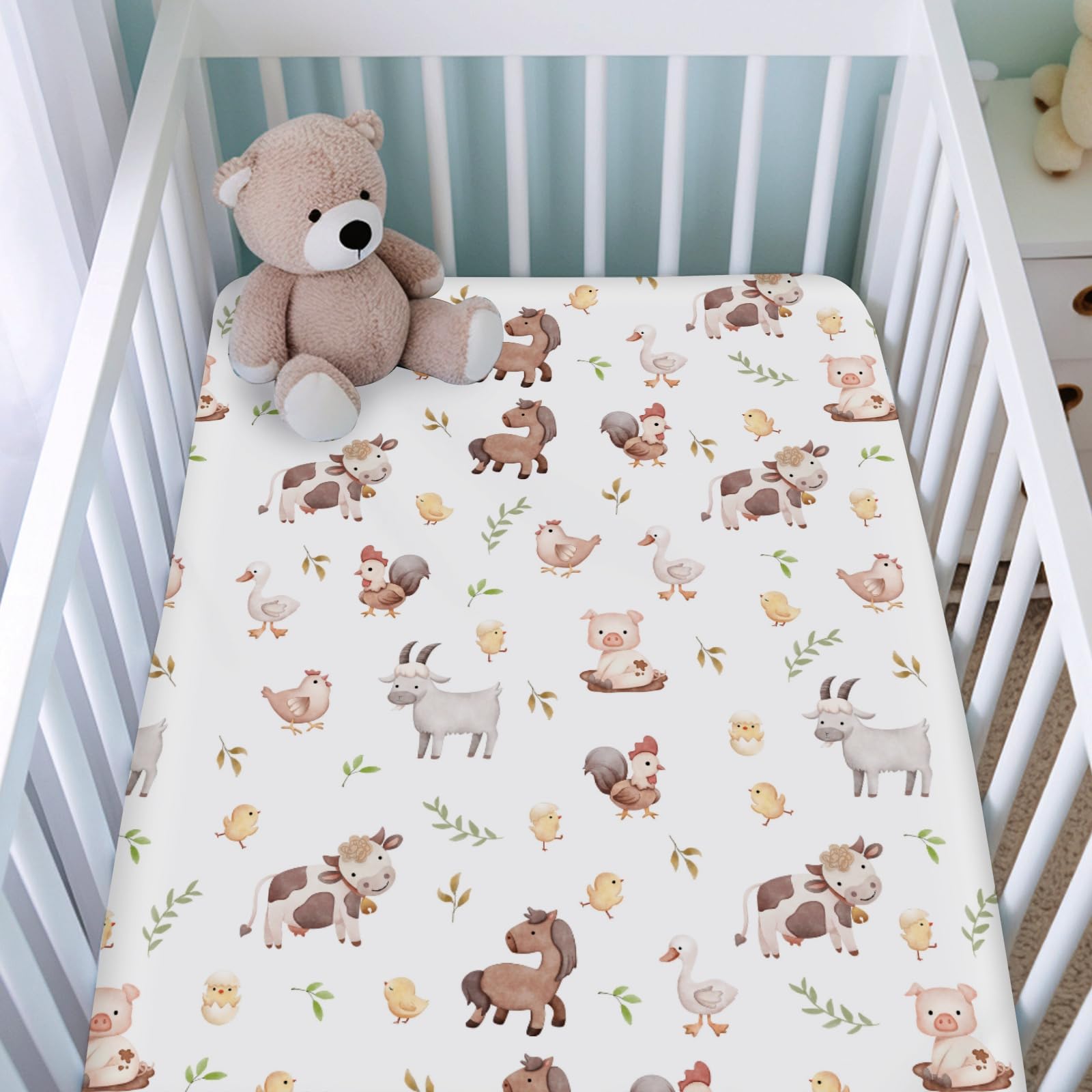 KASTLEE watercolor farm life goat crib sheet; cozy, easy-care fabric for bedtime.
