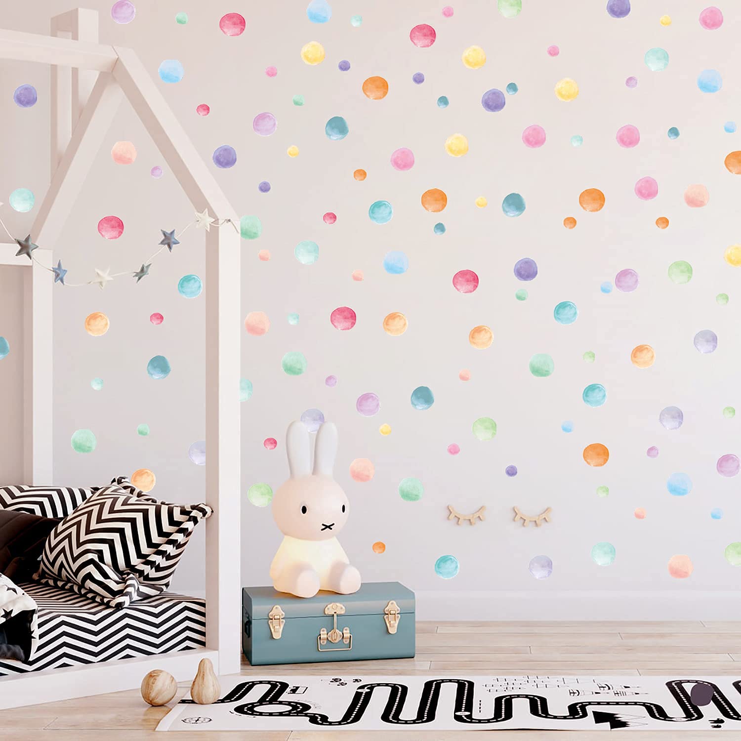 Kasubeso pastel polka dots wall stickers seen from both sides on glass surfaces.