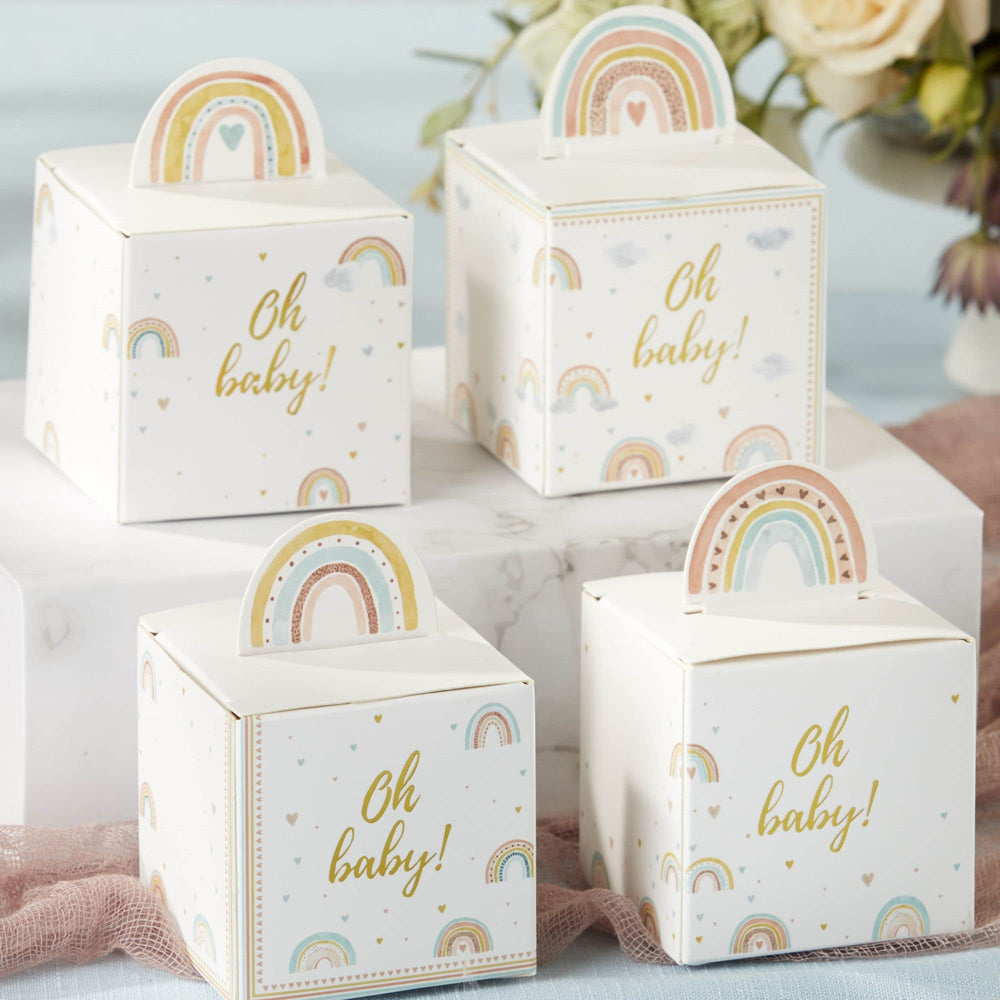 Watercolor rainbows decorate the sides for decorative baby shower keepsakes