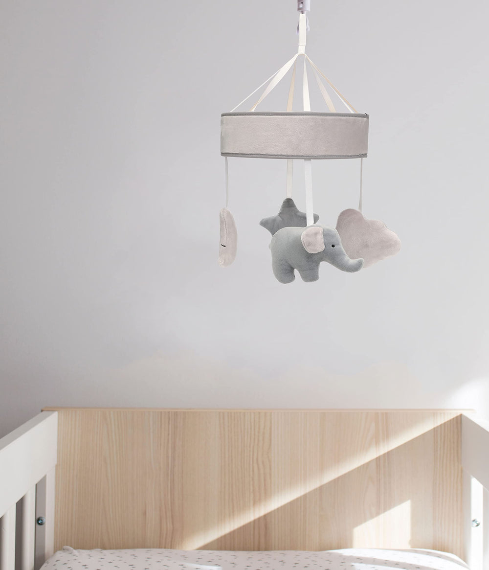 Kate and Milo elephant mobile features cloud, star, and moon accents for soothing focus.