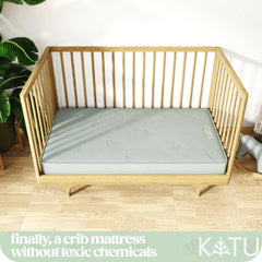 KATU two-sided infant-to-toddler design visible for growing sleep needs.