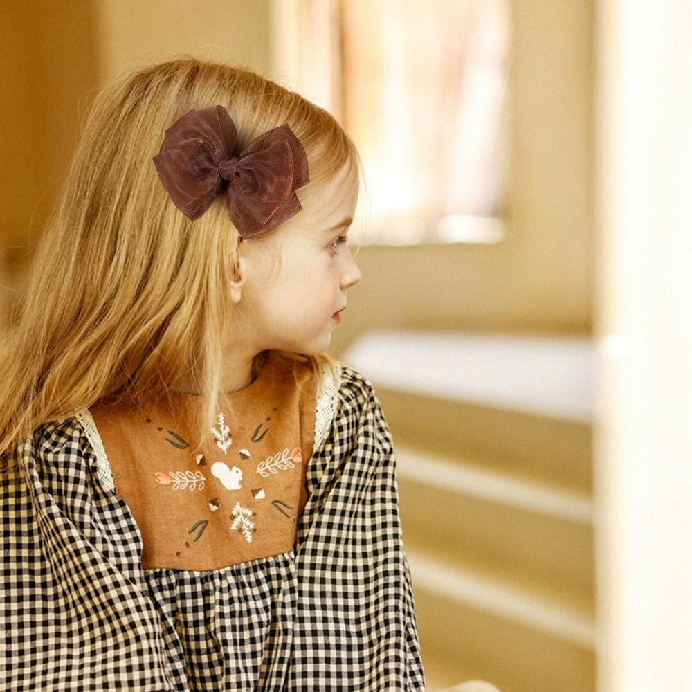 4-inch bow detail showing lightweight, airy fabric for daily wear