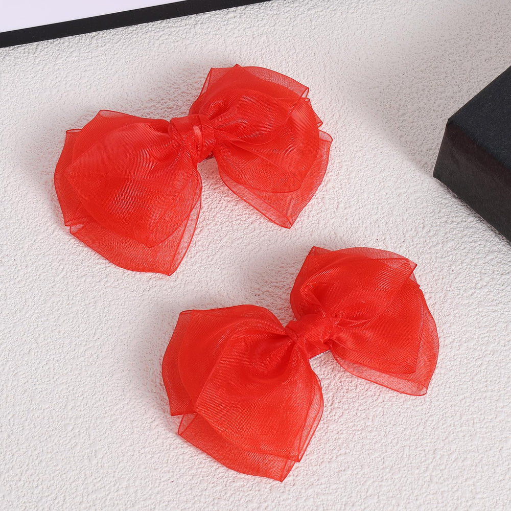 KCHIES Poppy Red organza double bow with secure, comfortable grip.