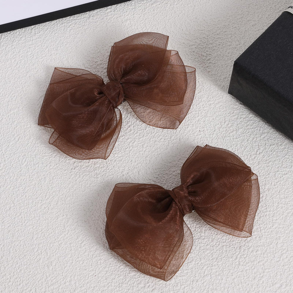 Close-up of organza double tulle texture on brown bow