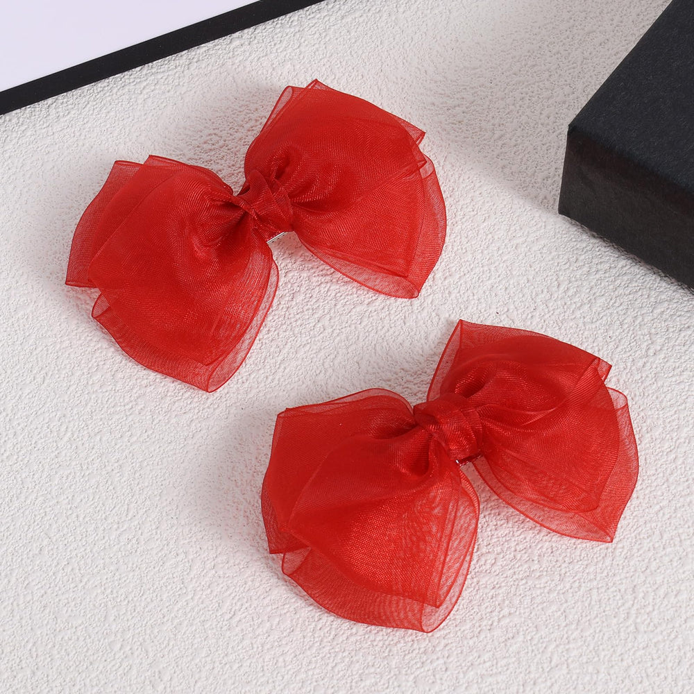 KCHIES red mesh bow clip side view, lightweight comfort for all hair types