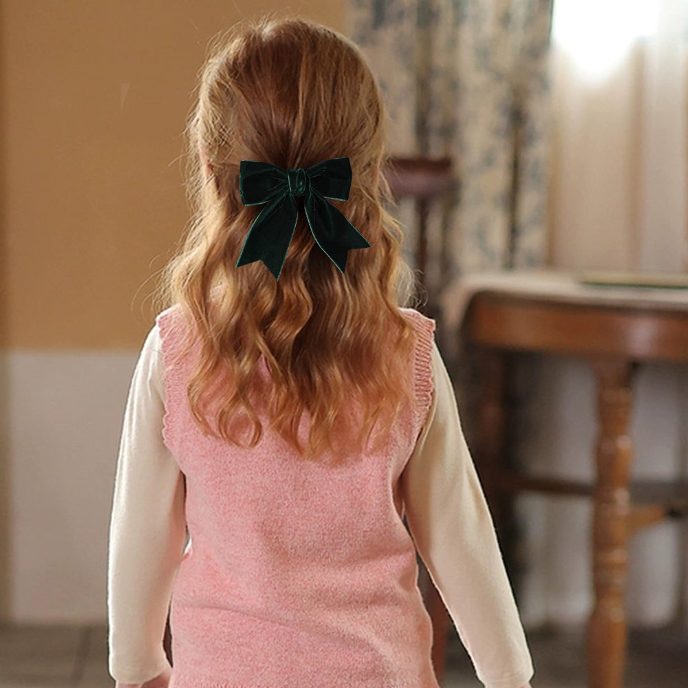 KCHIES velvet bow knot closeup highlighting secure hold.