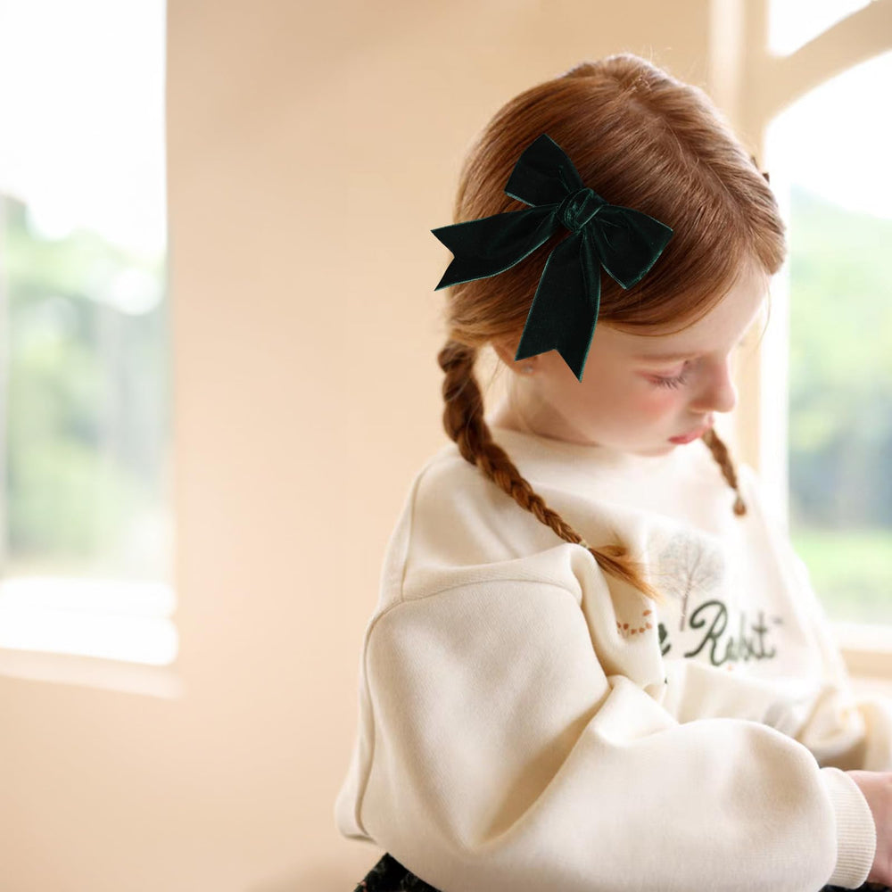 KCHIES velvet bow pair complements braids and ponytails.