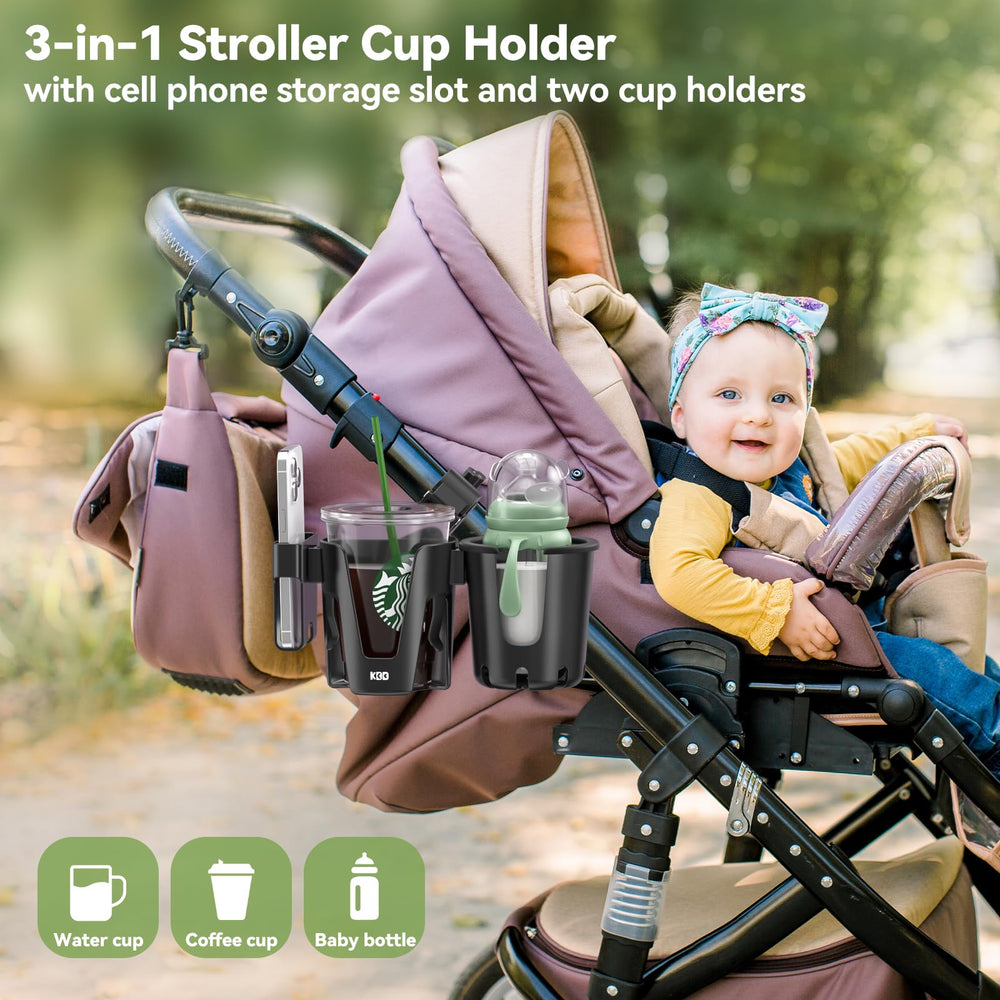 KDD dual cup and phone slot attachment on a stroller.