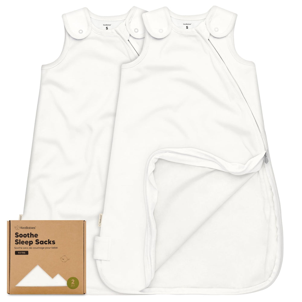 KeaBabies 2-pack sleep sacks in soft white, breathable 0.5 TOG for all-season comfort.
