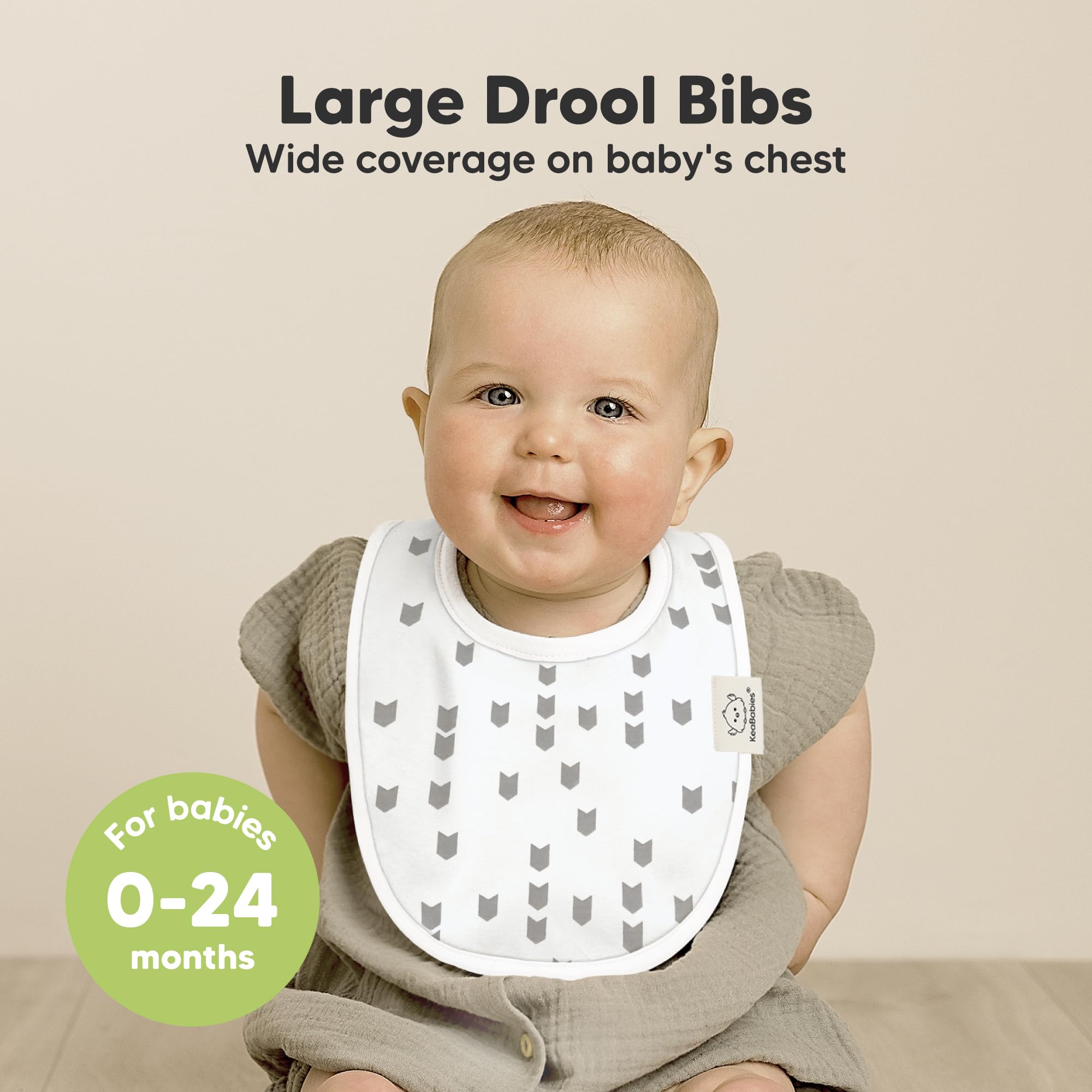 KeaBabies bibs draped on baby, showing drool absorption capability.