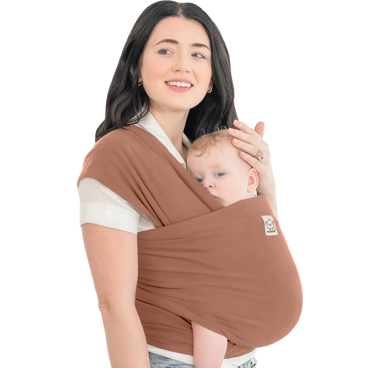KeaBabies baby wrap carrier terracotta worn by a parent for on-the-go comfort