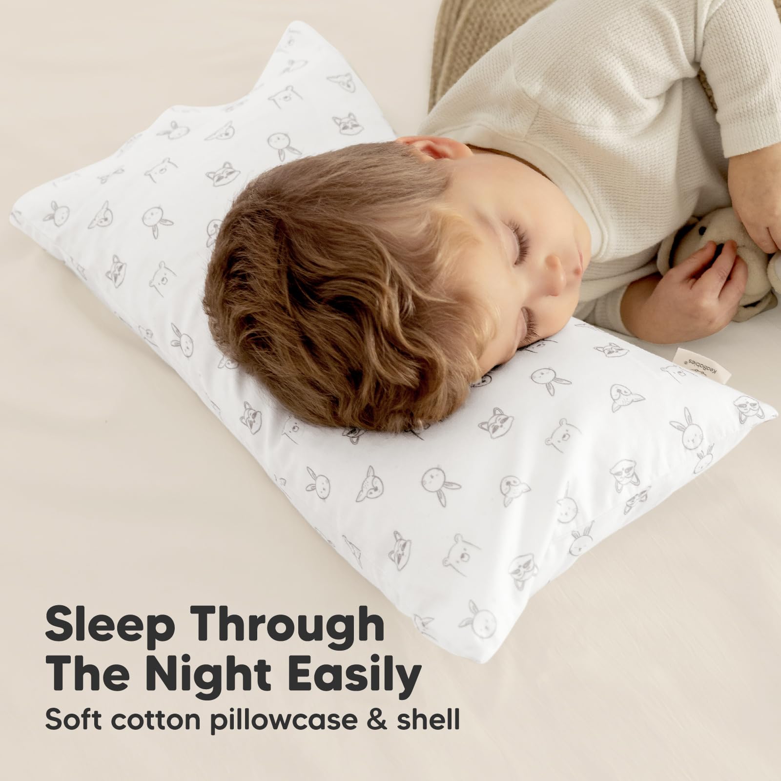 KeaBabies Buddy ergonomic design for comfortable sleep and gentle play breaks.