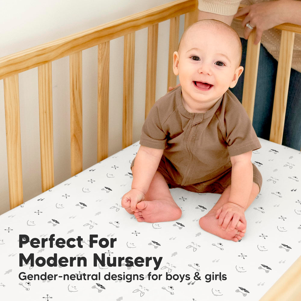 52x28 crib mattress fit shown with neutral tone.