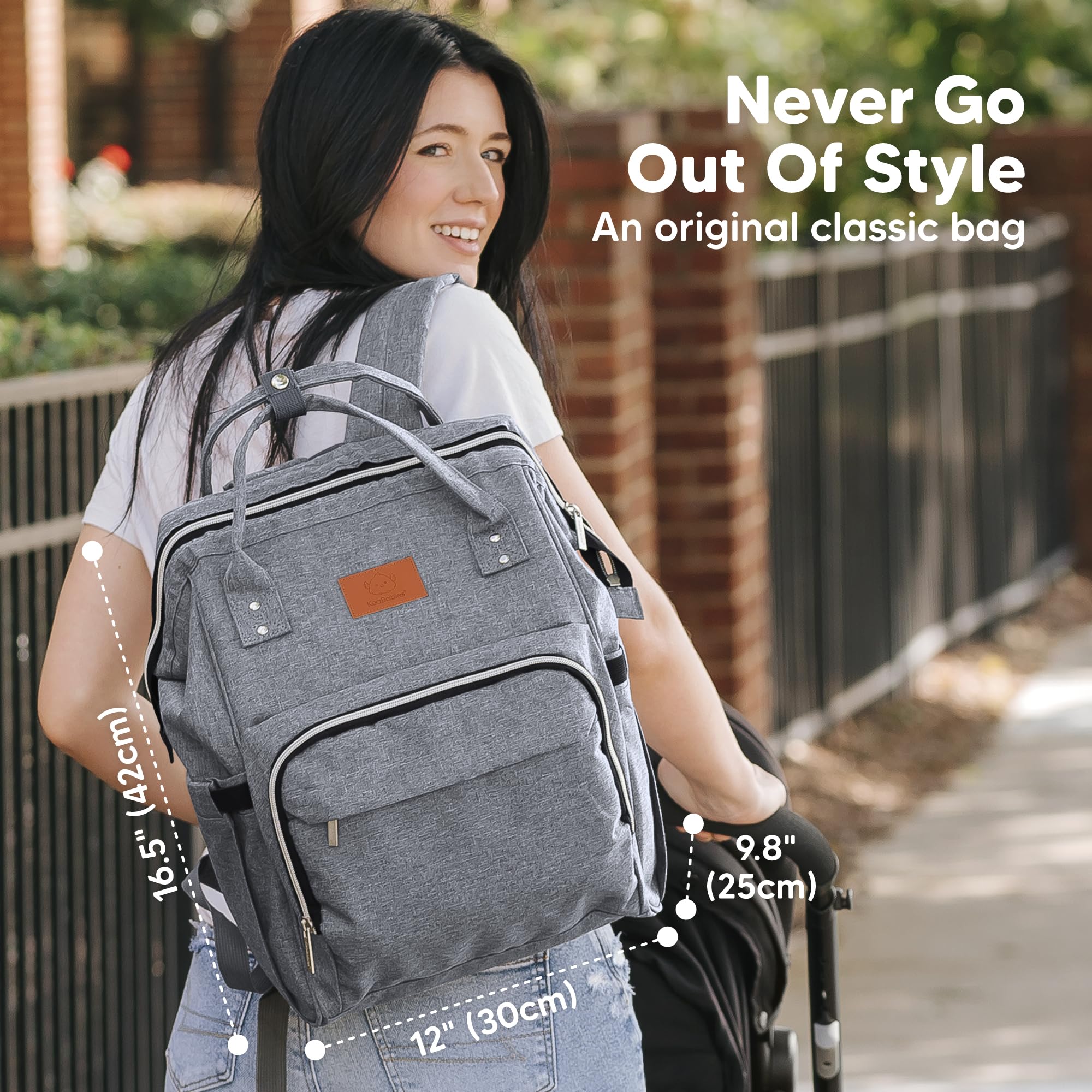 KeaBabies Diaper Bag Backpack Classic Gray side view highlighting easy-access pockets.