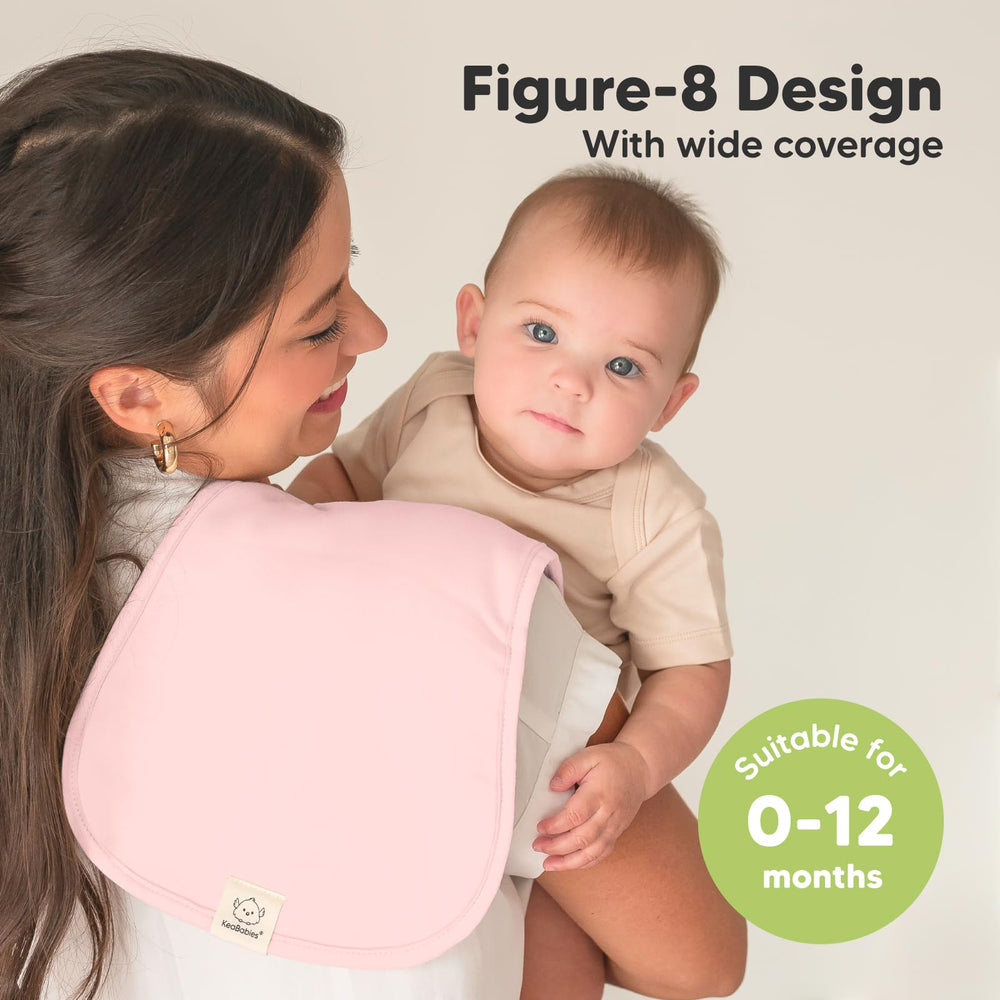 Figure-8 shoulder coverage keeps burp cloths in place during feeds.