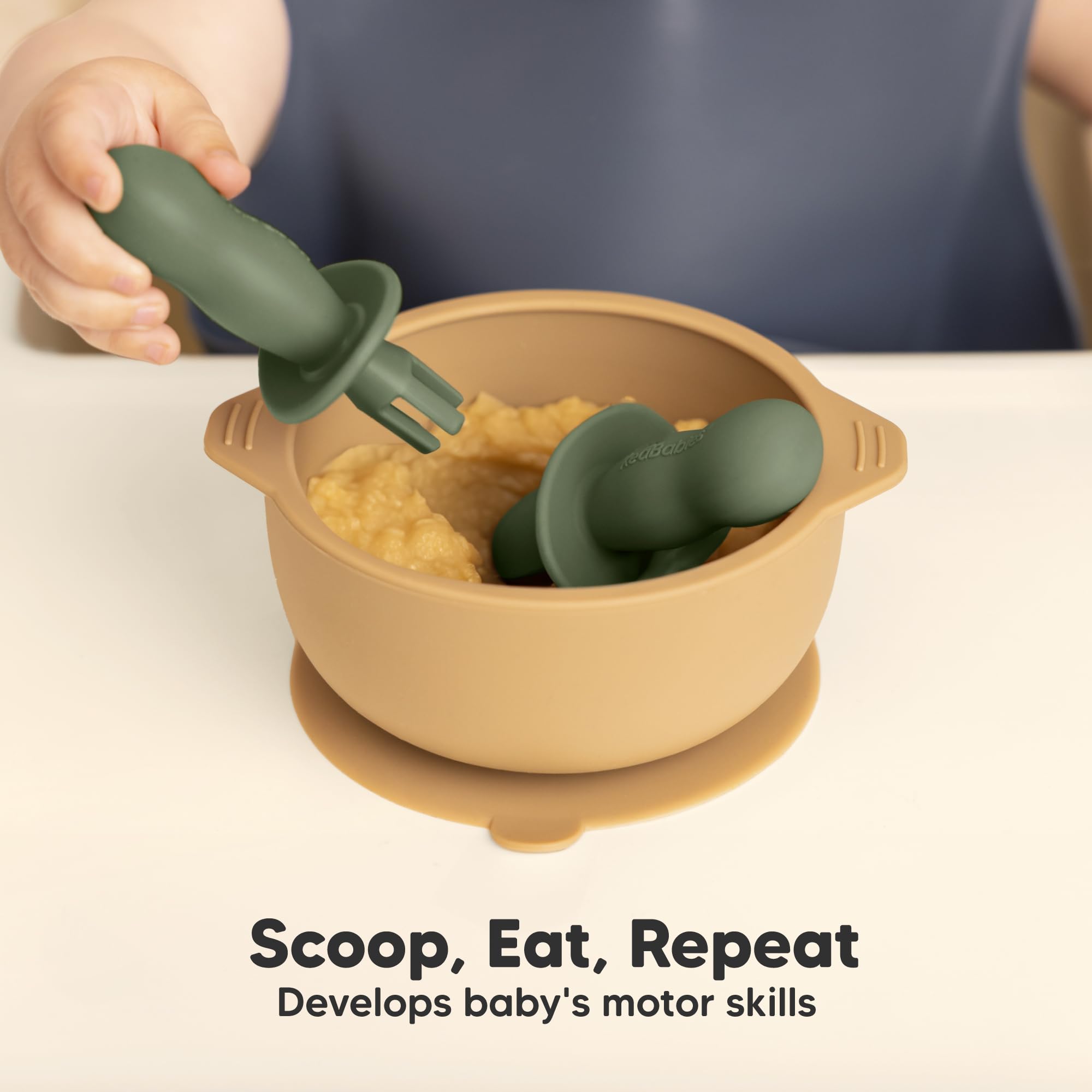 KeaBabies ergonomic handles help little fingers grip during feeding practice.