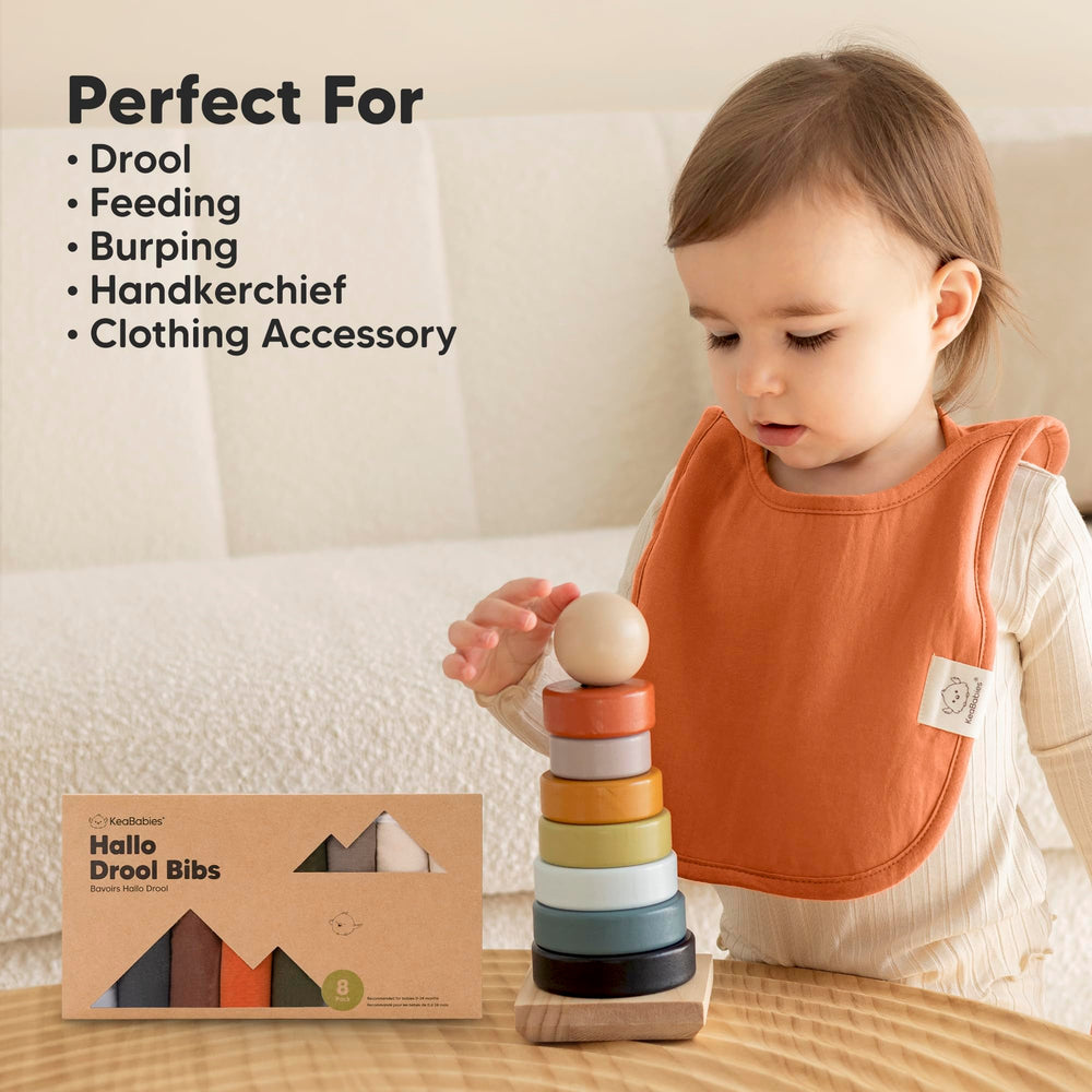 KeaBabies Hallo bib in use on an active toddler offering full torso coverage.