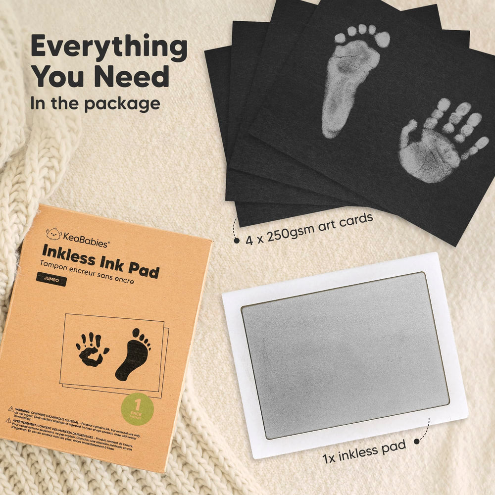 Newborn handprint captured with KeaBabies inkless pad on art card