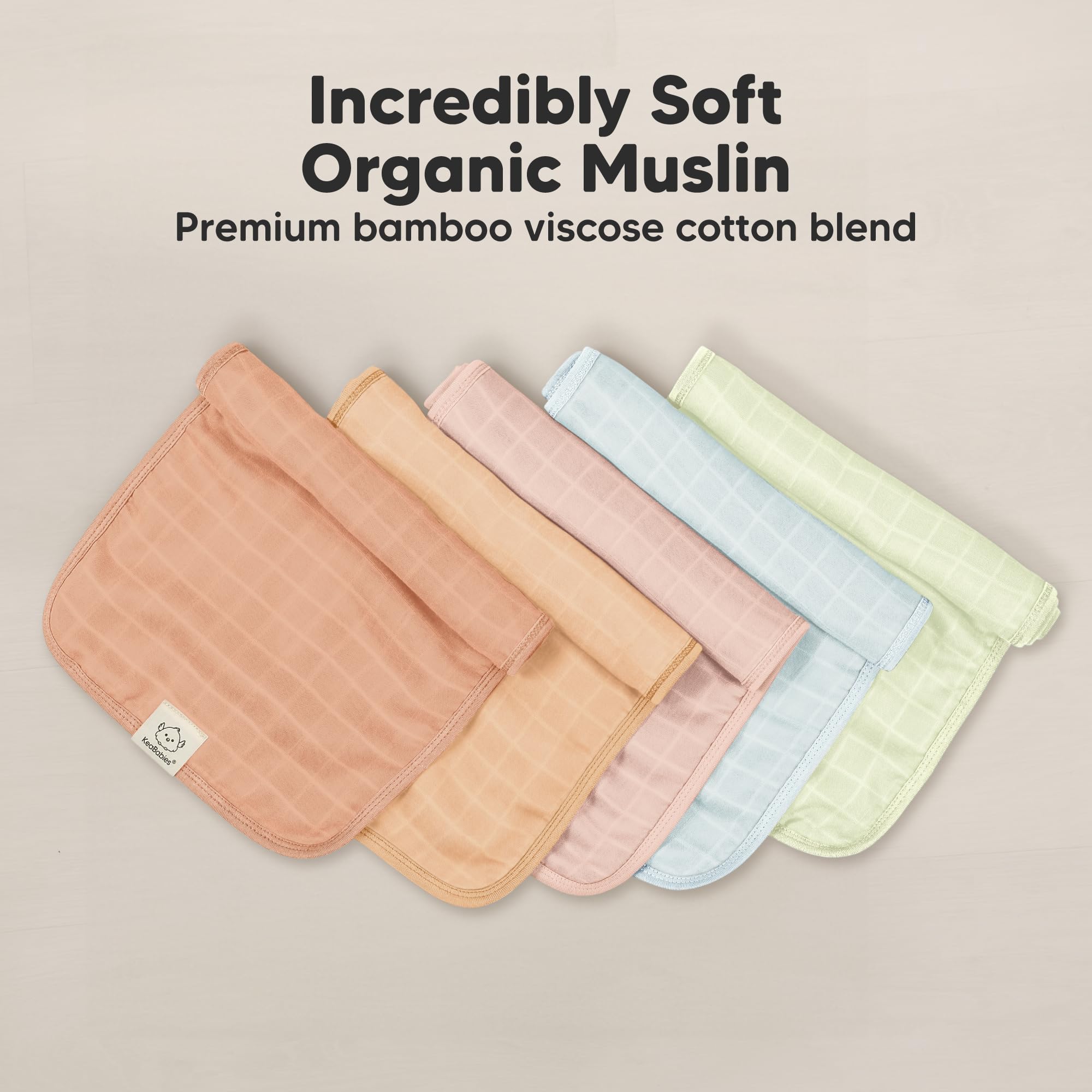 KeaBabies Lumi burp cloth in use during feeding, demonstrating gentle touch and mess control.