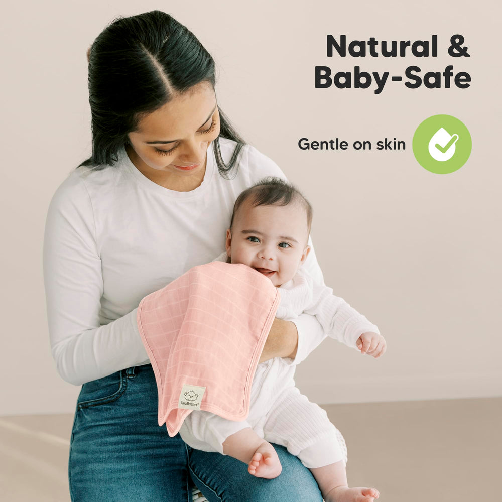 KeaBabies Lumi burp cloths in laundry, wrinkle-free and machine washable.