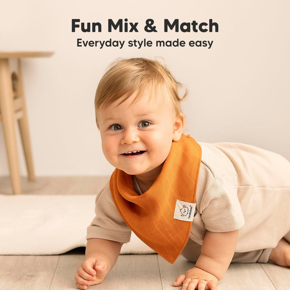 KeaBabies Lumi Muslin Bibs on a teething baby, perfect for drool management