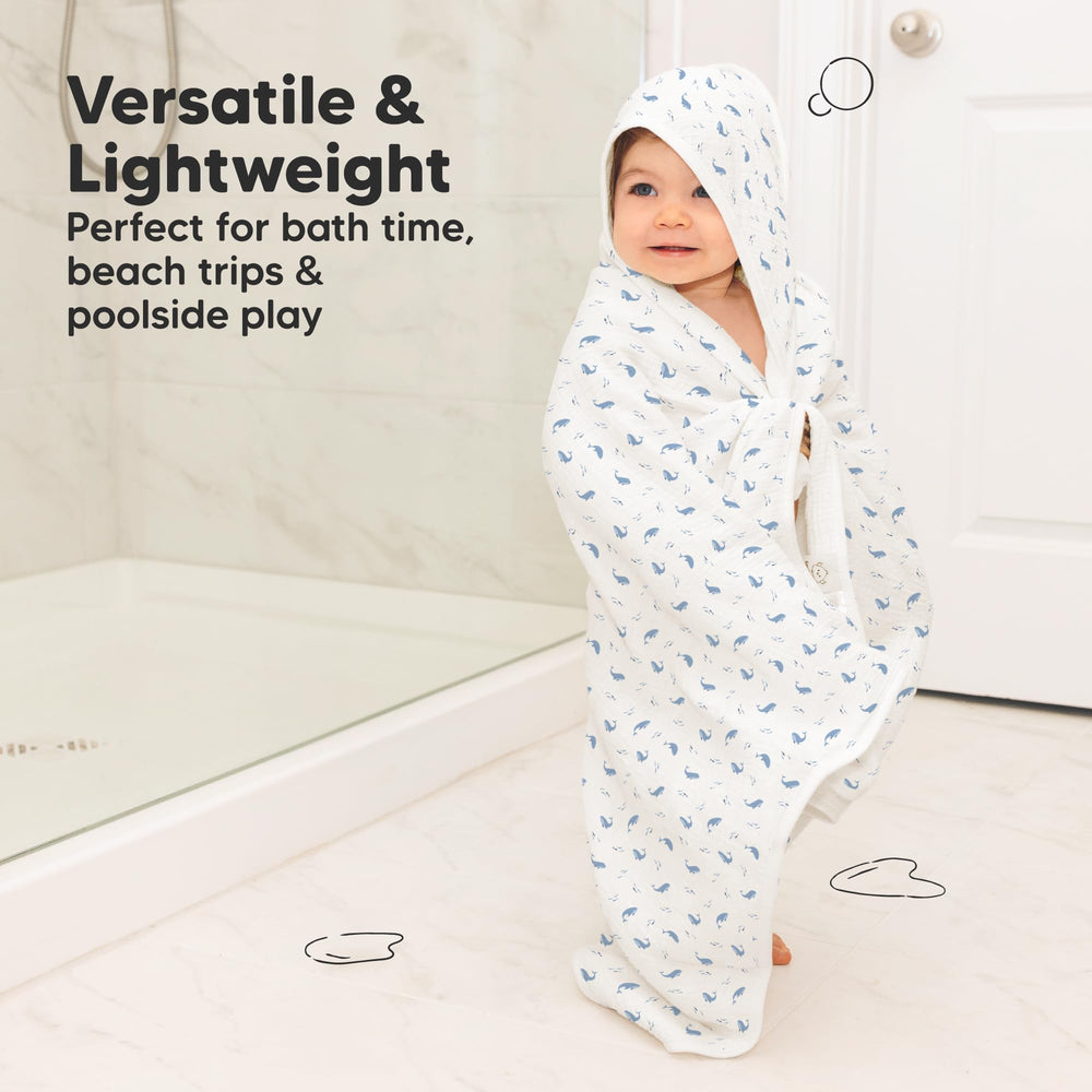 Gender-neutral Whale Bay design complements any nursery.