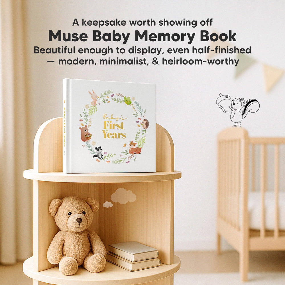 KeaBabies Muse memory book inside spread features guided prompts for milestones.