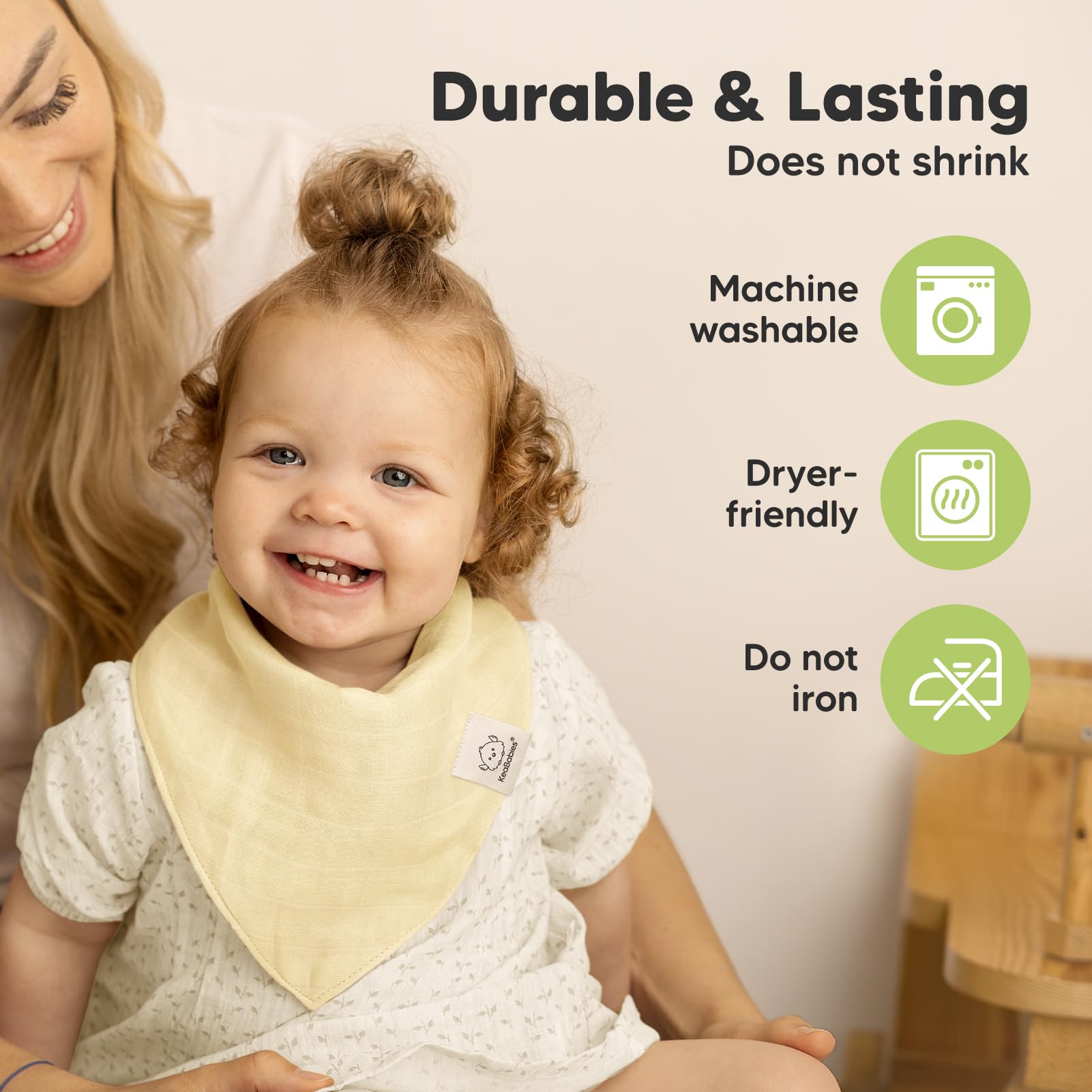 Baby wearing bib during teething with drool is practical