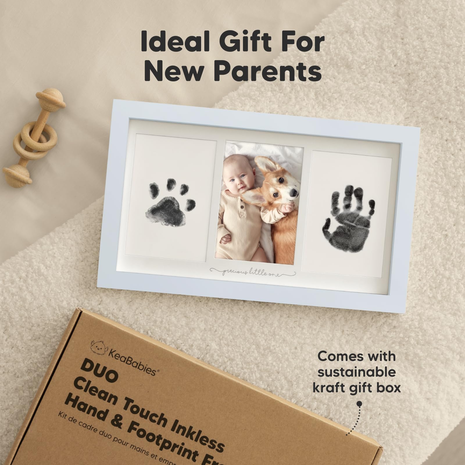 KeaBabies newborn footprint session with inkless pad and soft surface.