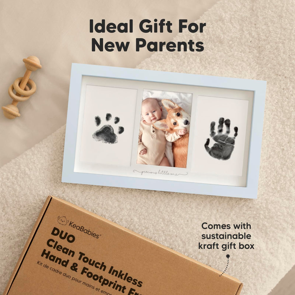 KeaBabies newborn footprint session with inkless pad and soft surface.