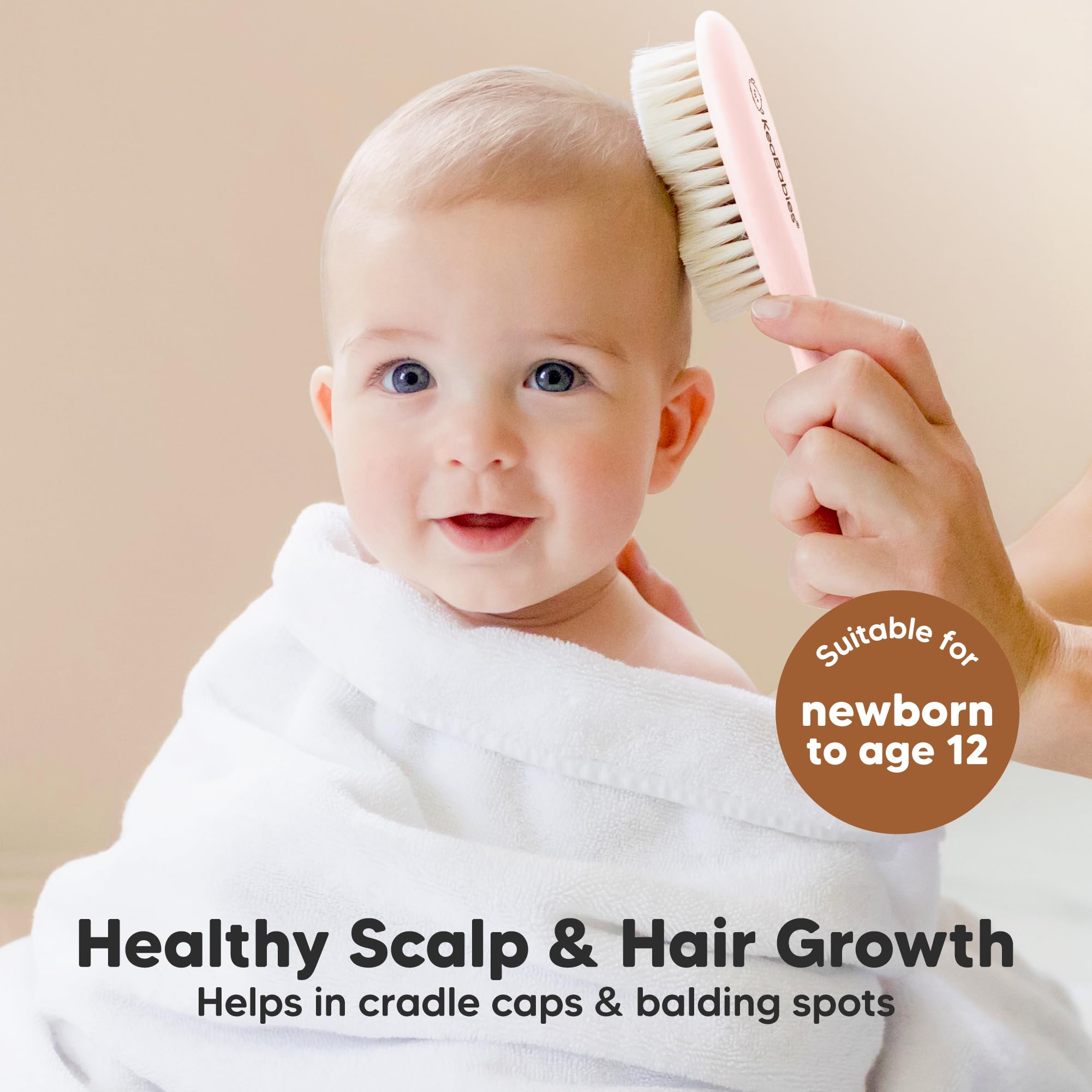 KeaBabies newborn hair brush with cotton loop handle for easy hanging