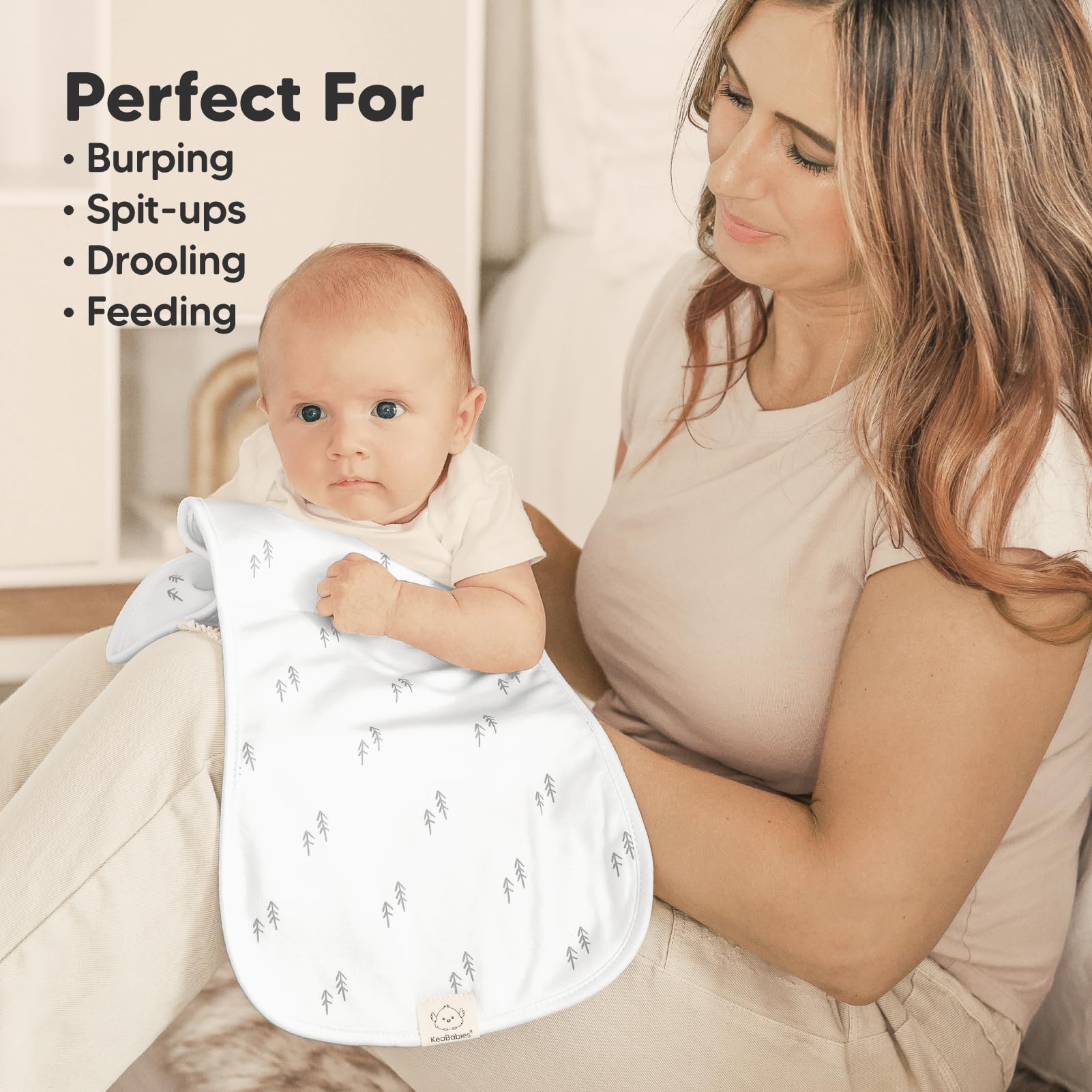 Gender-neutral design of KeaBabies burp cloths blends with any outfit