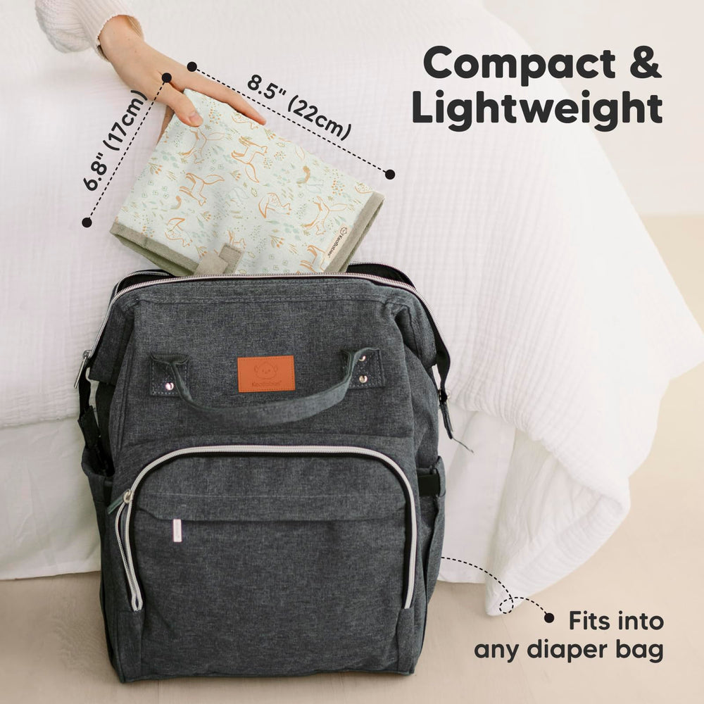 KeaBabies portable changing pad folded into compact clutch for on-the-go storage.