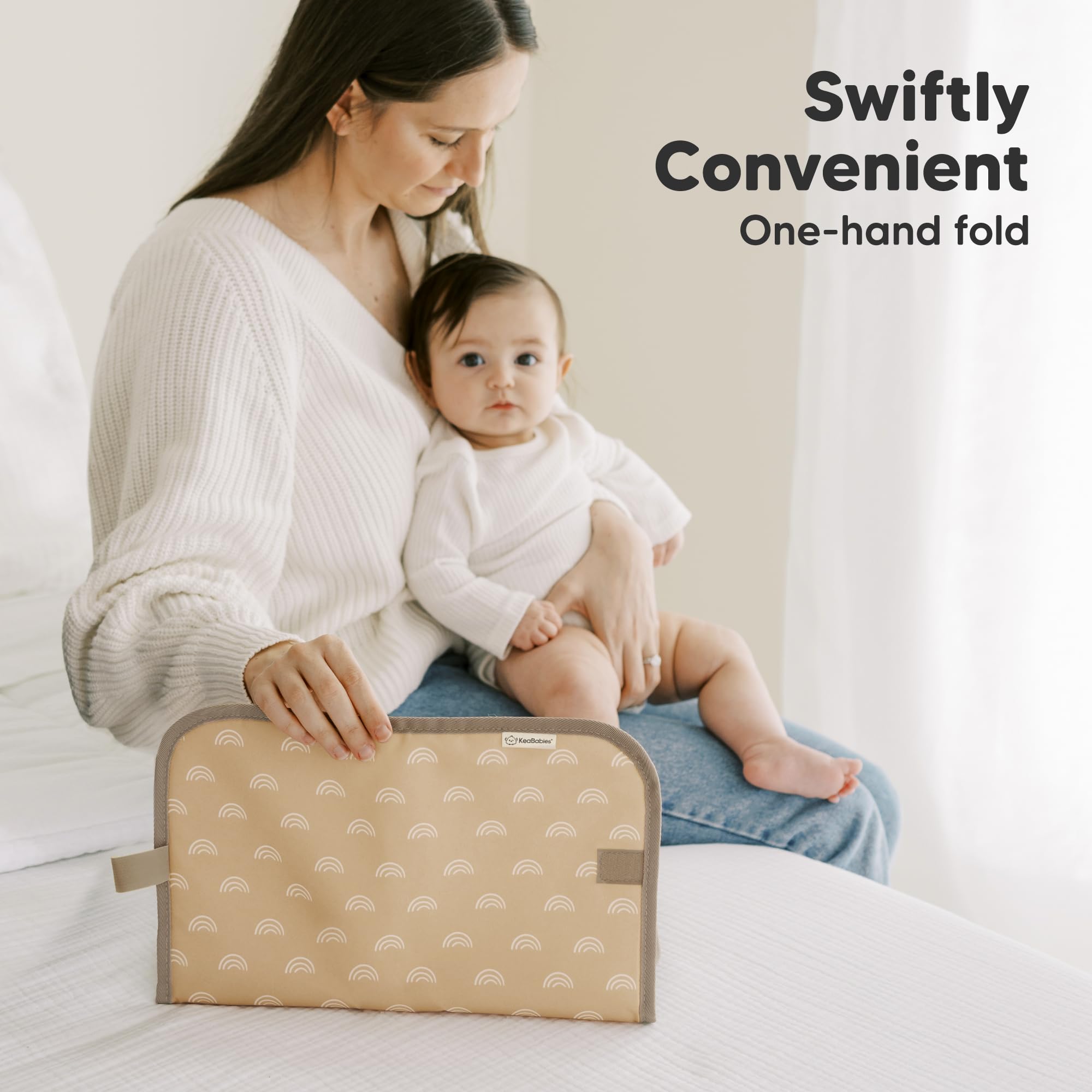 KeaBabies portable changing pad placed inside diaper bag for travel