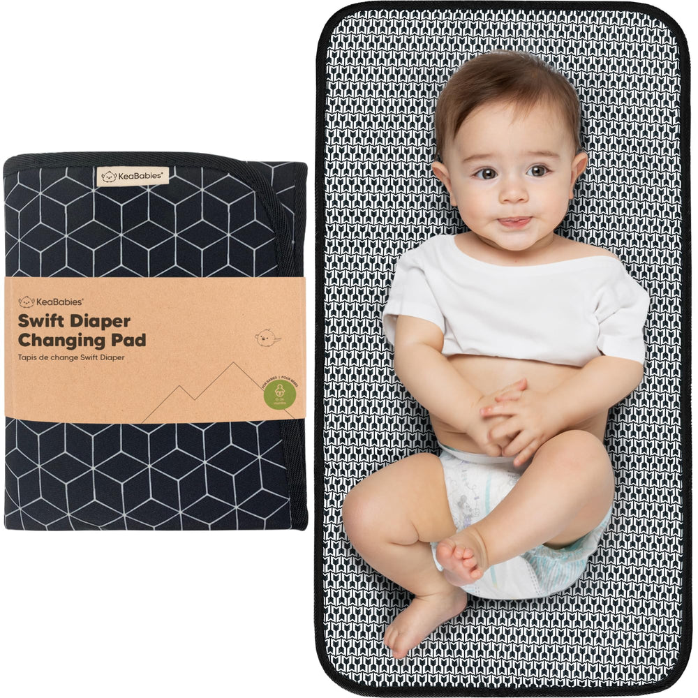 KeaBabies portable changing pad open with spacious area for quick diaper changes.