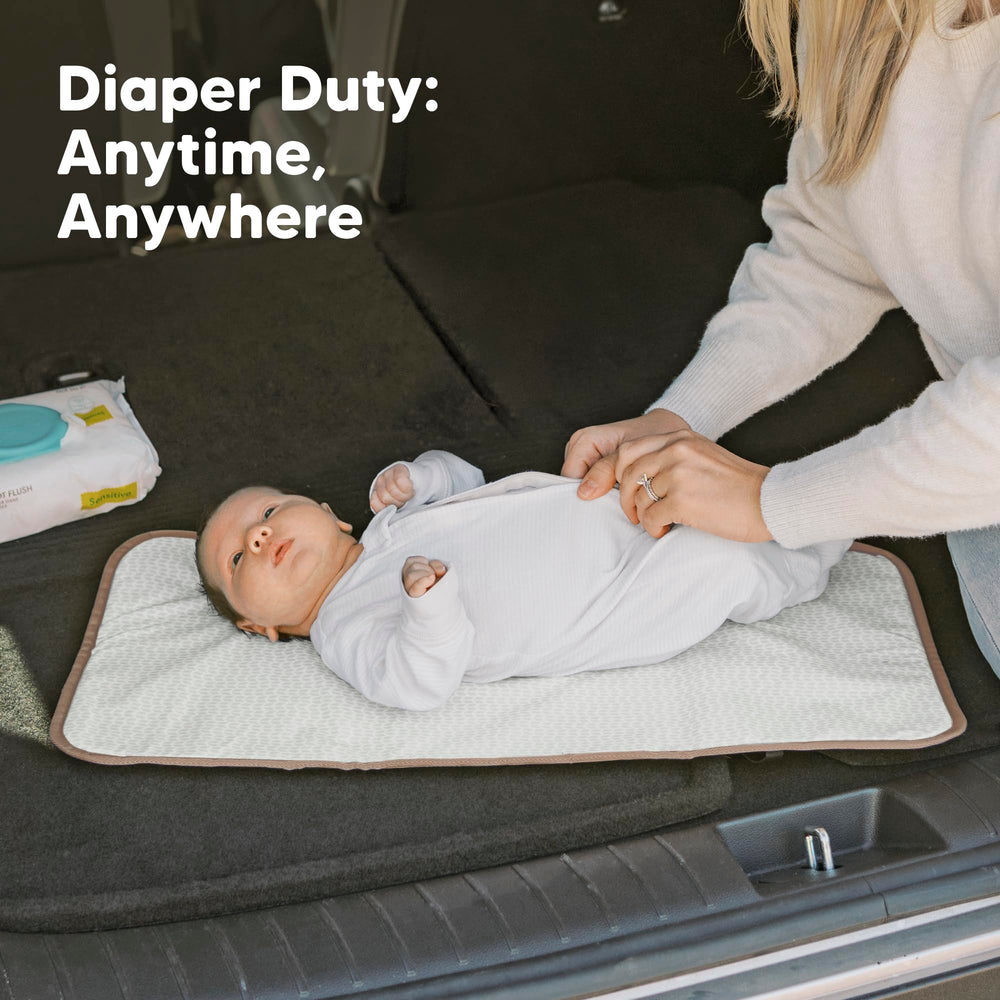 KeaBabies changing pad in public changing station protects baby from rough surfaces