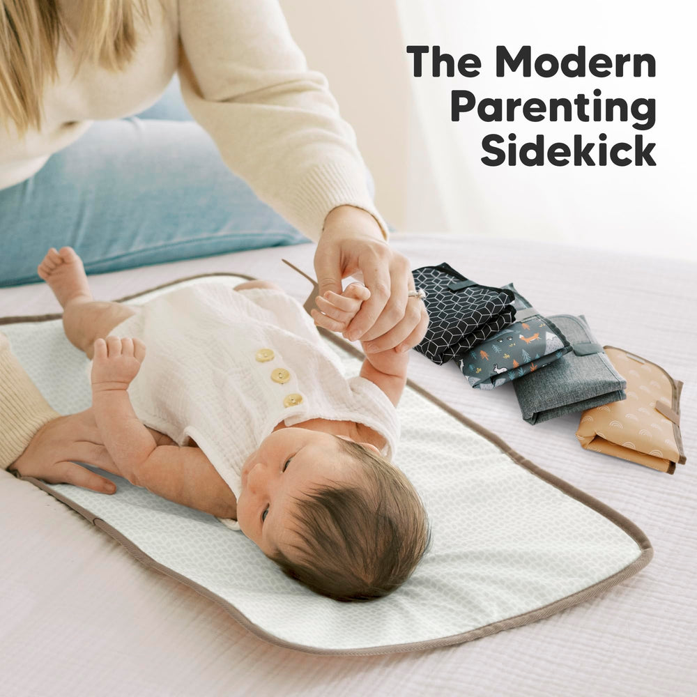 KeaBabies rainbow-design changing pad adds cheerful color to care
