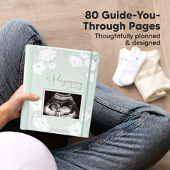 Inside pages with prompts for milestones and emotions in the KeaBabies journal