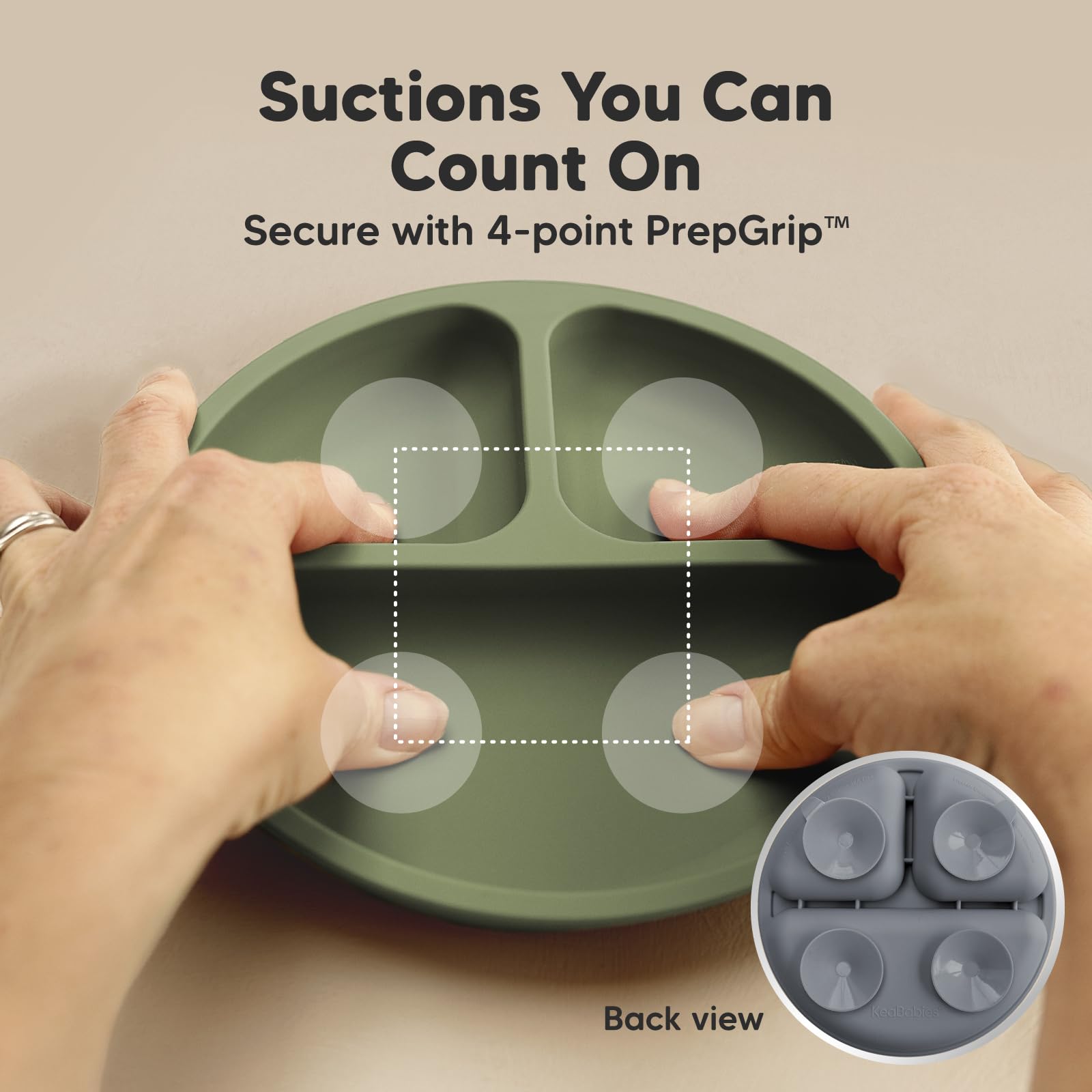 KeaBabies PrepGrip suction technology demonstrated on plate for secure adherence on flat surfaces.