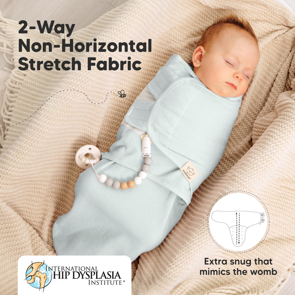 KeaBabies Wren Swaddle IHDI-certified hip design supports ergonomic positioning.