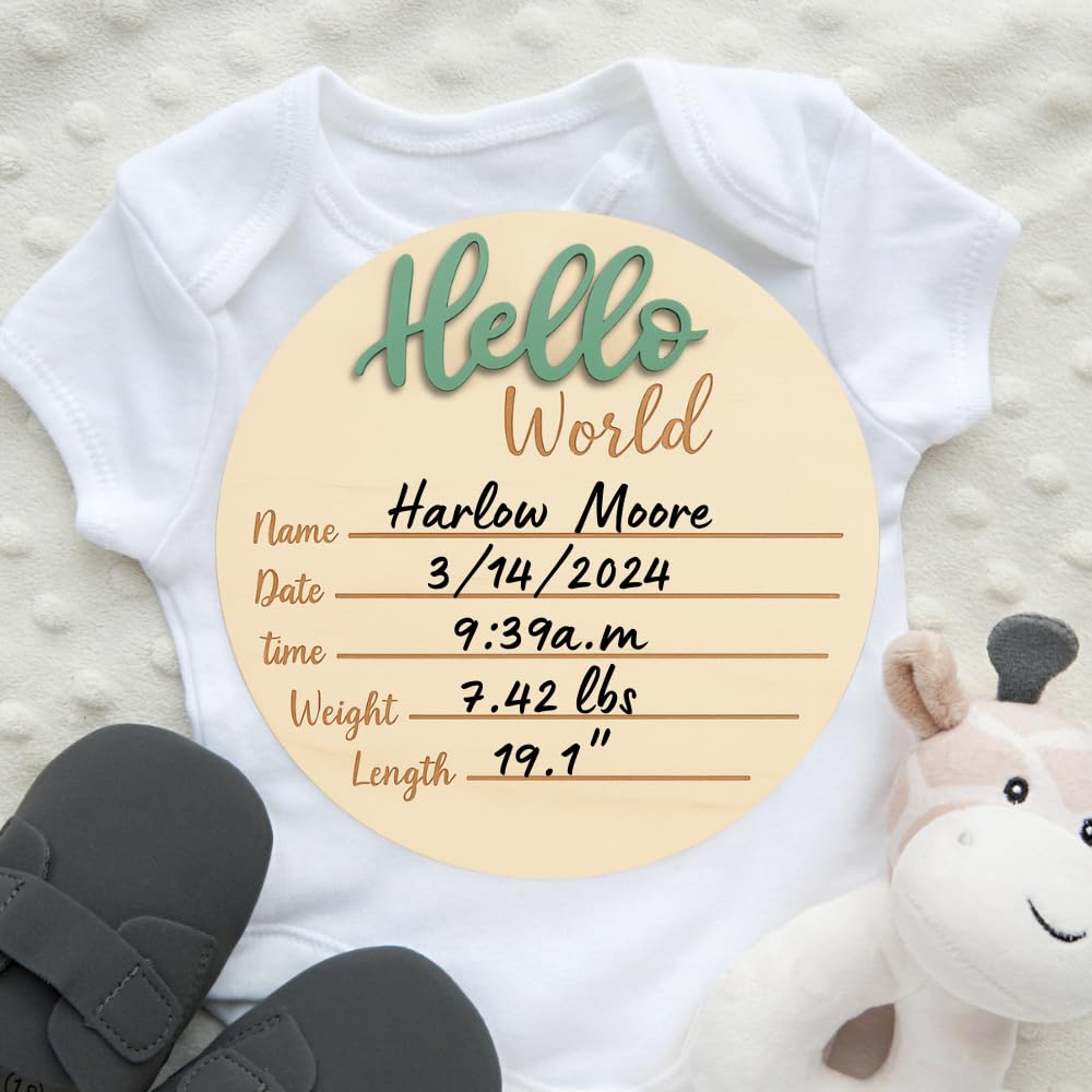Kemina birth stats plaque in wood, displays date, time, and weight.