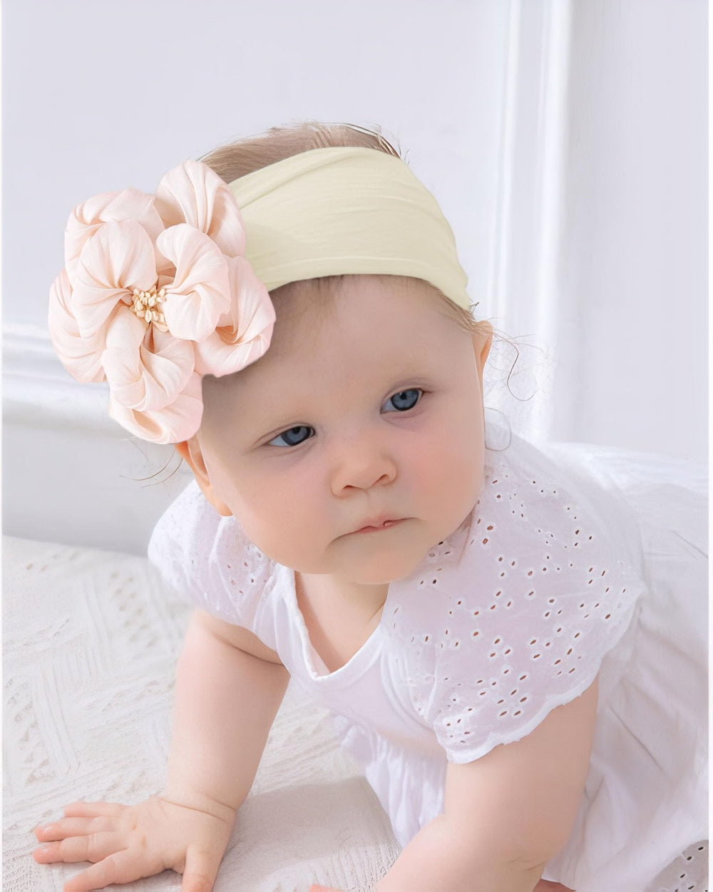 Kenjudess flower headband in off-white pairs with neutrals for elegance