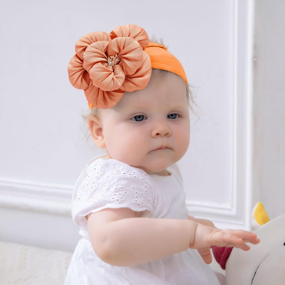 Kenjudess yellow nylon flower headband adds cheerful color